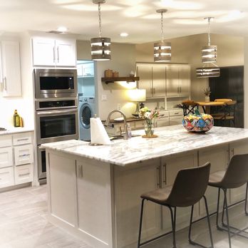 Rochier Contracting - a kitchen with a center island - Drywall Installation & Repair Near Me Rochier Contracting - a kitchen with a center island - Drywall Installation & Repair Near Me