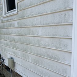Presnell's Pressure Washing - Side of my house before and after.