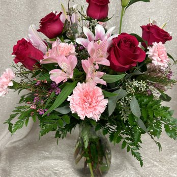 Curtis Flower Shop - Carnations, Roses & Lilies make a lovely arrangement for any occasion - Florists Near Me - Flint, Michigan Curtis Flower Shop - Carnations, Roses & Lilies make a lovely arrangement for any occasion - Florists Near Me - Flint, Michigan