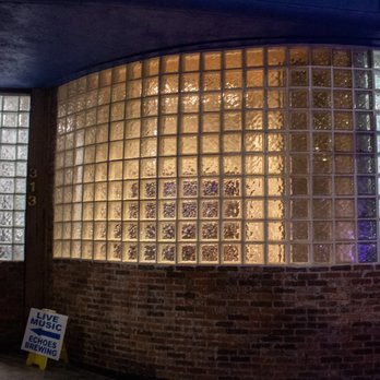 Echoes - a brick building with a glass block wall - Music Venues Near Me - Albuquerque, New Mexico