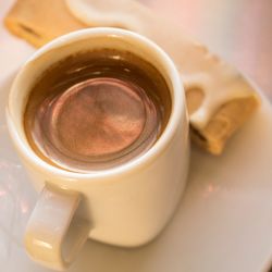 Yellow Derny Cafe - Espresso served with a biscotti