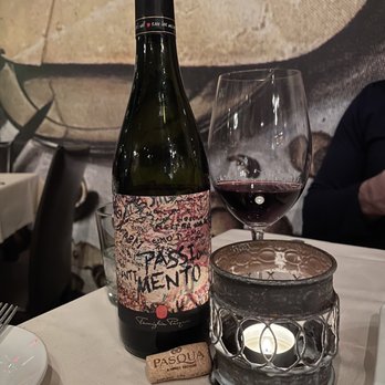 Bella Piatti - a glass of wine and a bottle of wine - Italian Near Me - Birmingham, Michigan