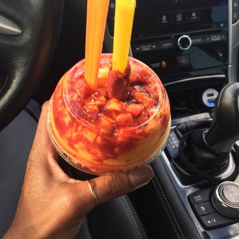 Magic Cup - Cha-Mango 16oz with straw covered in powder (yum) - Coffee & Tea Near Me - Houston, Texas Magic Cup - Cha-Mango 16oz with straw covered in powder (yum) - Coffee & Tea Near Me - Houston, Texas