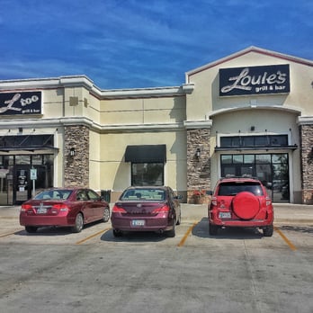 Louie's Grill and Bar - The view as you're walking up. - American Near Me - Moore, Oklahoma Louie's Grill and Bar - The view as you're walking up. - American Near Me - Moore, Oklahoma