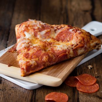 QuikTrip - a slice of pepperoni pizza on a cutting board - Convenience Stores Near Me - Phoenix, Arizona