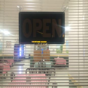 Bravo Pizza & Restaurant - Open sign walking in around 9pm 5-25-15 - Pizza Near Me - Harvard, Illinois Bravo Pizza & Restaurant - Open sign walking in around 9pm 5-25-15 - Pizza Near Me - Harvard, Illinois