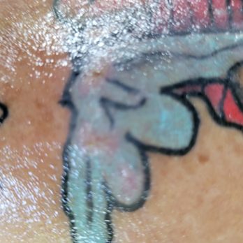 Black Sails Tattoo - The Linus tattoo has cellulitis all over the skin - Piercing Near Me - Port Charlotte, Florida Black Sails Tattoo - The Linus tattoo has cellulitis all over the skin - Piercing Near Me - Port Charlotte, Florida