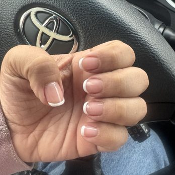 Jo Nails 2 - French tip on left hand is way thicker than the right. I asked her to make them thinner but she did me dirty. - Nail Salons Near Me - Manteca, California