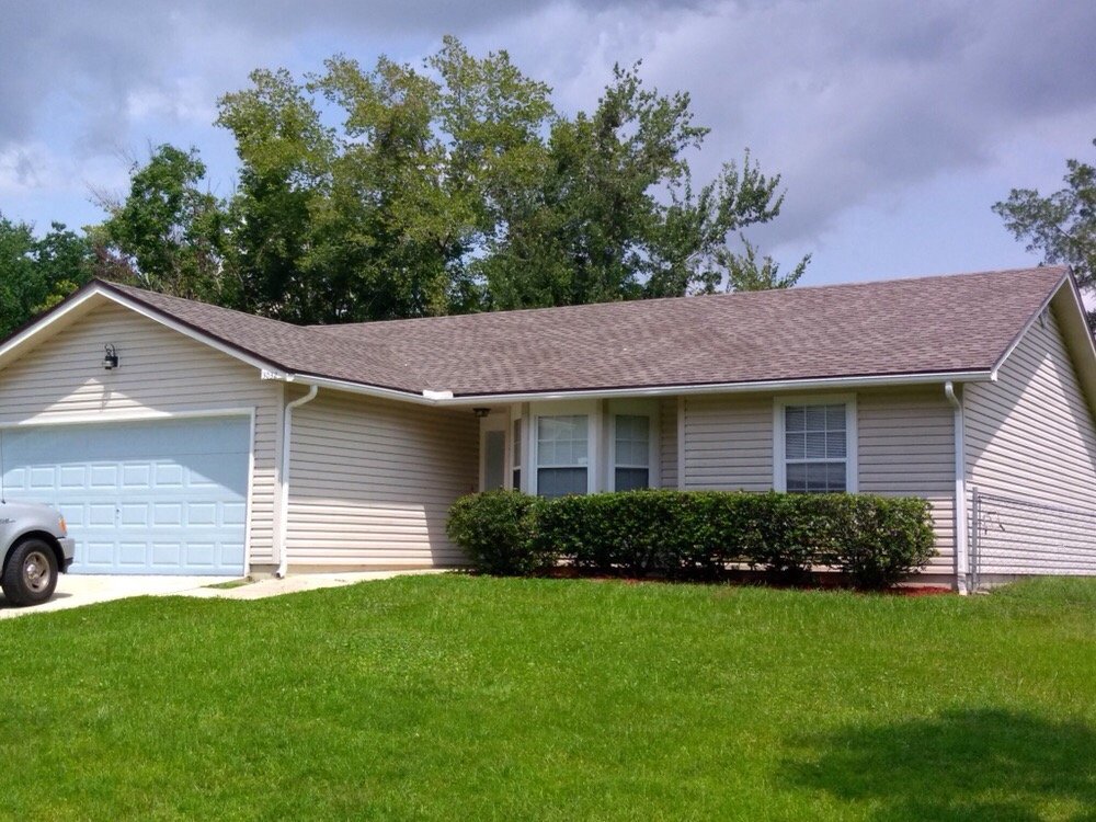 Slide of Patriot Roofing Services