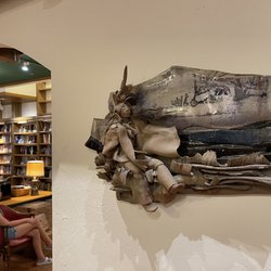 Full Circle Bookstore - Nice artwork  on the wall with a peek into the next room.