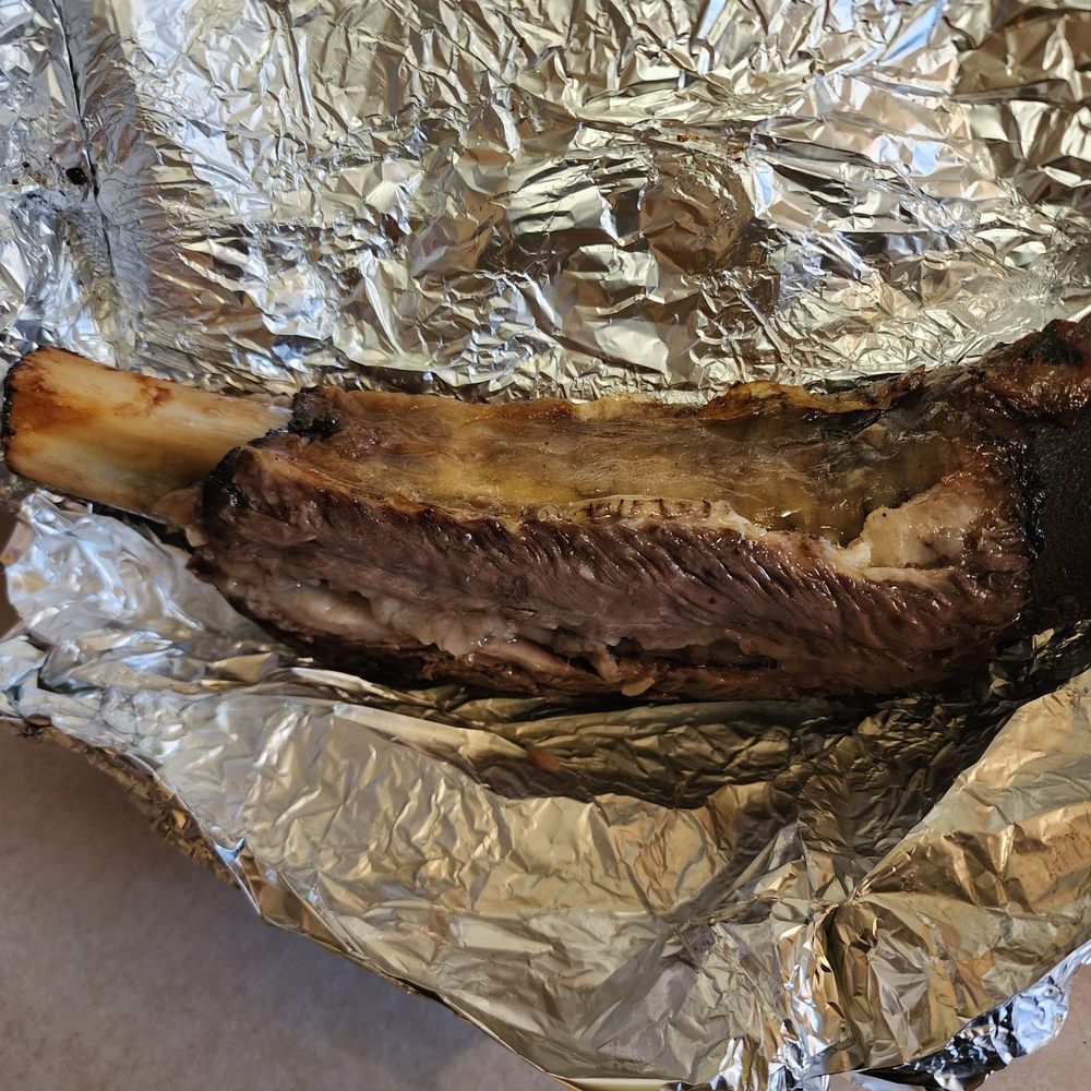 Ubuntu Meat Bar & Safari Spice Grill - Dino beef rib too big to fit in a box and fall off the bone tender - Barbeque Near Me - Everett, Washington Ubuntu Meat Bar & Safari Spice Grill - Dino beef rib too big to fit in a box and fall off the bone tender - Barbeque Near Me - Everett, Washington