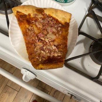 Giovanni's IV - In this photo is the slice they sent me with the tip cut off - Italian Near Me - Yonkers, New York