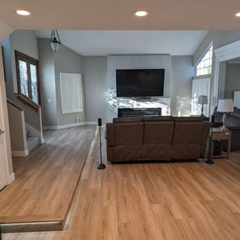 OC Elite Remodeling - Our new flooring where they filled in a step down to create a level space that we can enjoy and show off the new open concept. - General Contractors Near Me - Mission Viejo, California OC Elite Remodeling - Our new flooring where they filled in a step down to create a level space that we can enjoy and show off the new open concept. - General Contractors Near Me - Mission Viejo, California