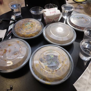 Gu's Dumplings - How the food is packaged and served at Gu's Dumplings - in circular plastic bowls with snap-shut lids. - Szechuan Near Me - Atlanta, Georgia Gu's Dumplings - How the food is packaged and served at Gu's Dumplings - in circular plastic bowls with snap-shut lids. - Szechuan Near Me - Atlanta, Georgia