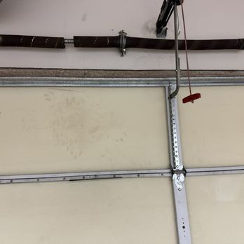 Best Buy Garage Doors - Broken spring - Garage Door Services Near Me