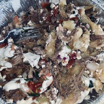 Burrito Loco Mexican Grill - Loco fries with pork and we had already eaten half of it - Mexican Near Me - Hampton, New Hampshire Burrito Loco Mexican Grill - Loco fries with pork and we had already eaten half of it - Mexican Near Me - Hampton, New Hampshire