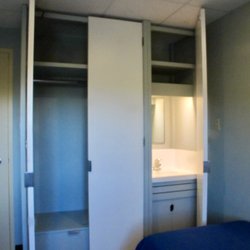 Mount Saint Vincent University - Blurry dorm room photo in Assisi Hall. wardrobe and sink