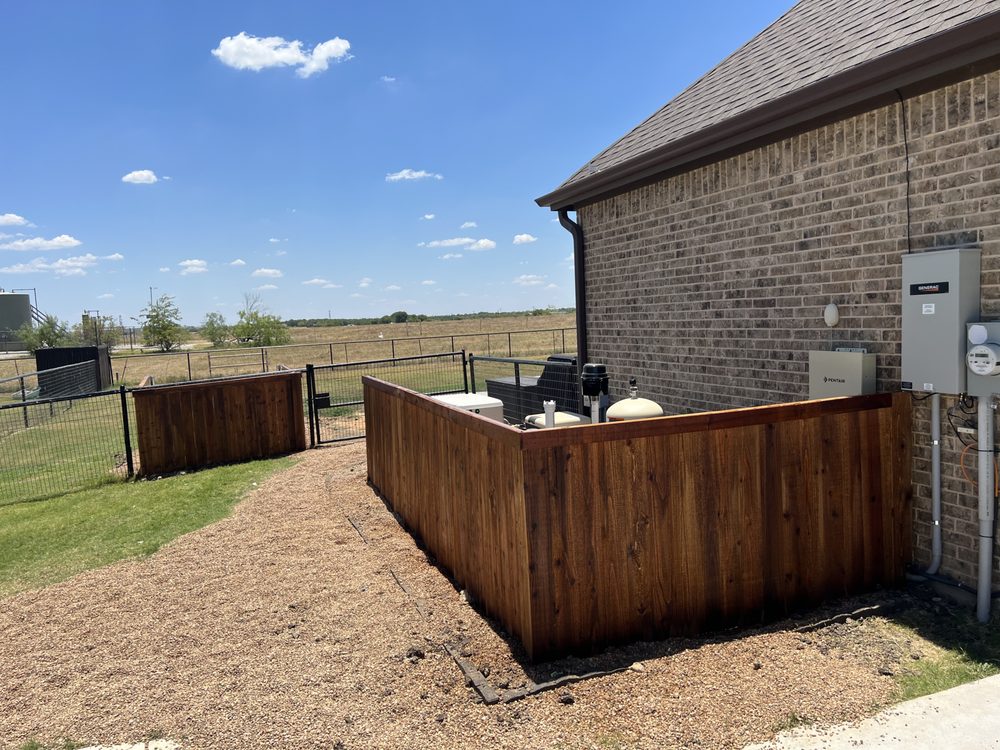 Slide of Grizzly Fence and Patio