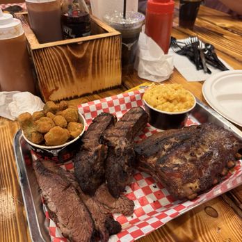 Big B’s Texas BBQ - our plate combo consisting of brisket, beef ribs and baby back pork ribs, side of fried okra and Mac & cheese - Barbeque Near Me - Las Vegas, Nevada Big B’s Texas BBQ - our plate combo consisting of brisket, beef ribs and baby back pork ribs, side of fried okra and Mac & cheese - Barbeque Near Me - Las Vegas, Nevada