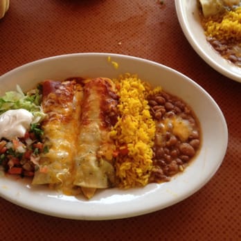 Mariachi Restaurant - Good portions, chicken enchilada comes with rice, beans, lettuce and sour cream - Mexican Near Me - Rehoboth Beach, Delaware Mariachi Restaurant - Good portions, chicken enchilada comes with rice, beans, lettuce and sour cream - Mexican Near Me - Rehoboth Beach, Delaware