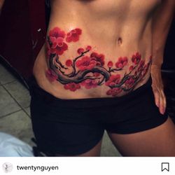 Red Blossom Art - Client wanted scars of hers covered up so I did a blossom tree to make her more comfortable in her skin. Done by the talented artist Twenty