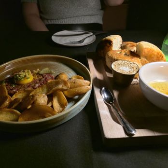 Butcher & The Bear - Wagyu Steak Tartare and Foccacia with Beef Tallow Candle (made in house) - Steakhouses Near Me - Chicago, Illinois Butcher & The Bear - Wagyu Steak Tartare and Foccacia with Beef Tallow Candle (made in house) - Steakhouses Near Me - Chicago, Illinois