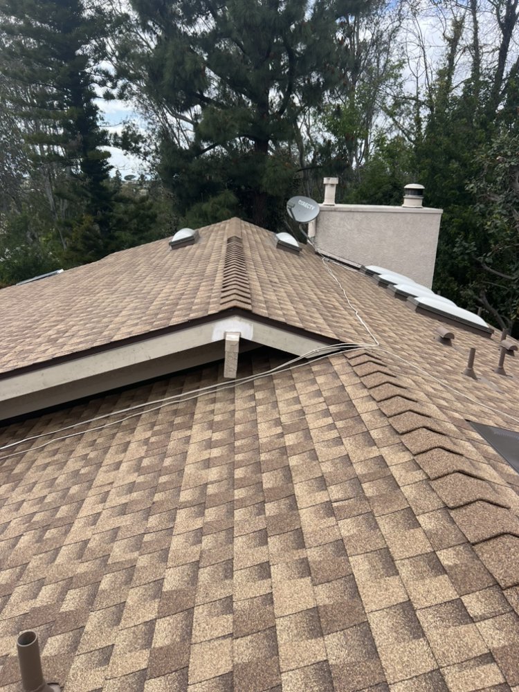 Slide of JVR Quality Roofing