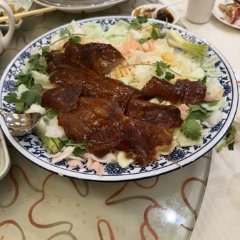 NBC Seafood Restaurant - Crispy duck skin on a bed of shrimp chips. - Seafood Near Me - Monterey Park, California NBC Seafood Restaurant - Crispy duck skin on a bed of shrimp chips. - Seafood Near Me - Monterey Park, California