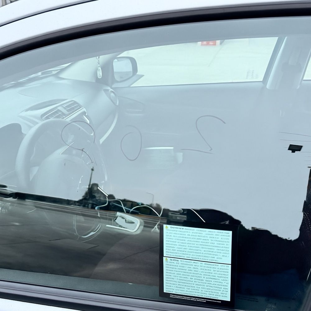 Why are they writing on the cars instead of tape or a receipt inside Why are they writing on the cars instead of tape or a receipt inside