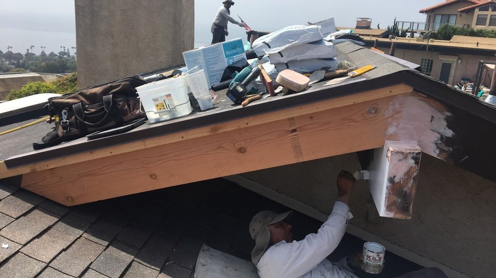 Slide of Action Roofing