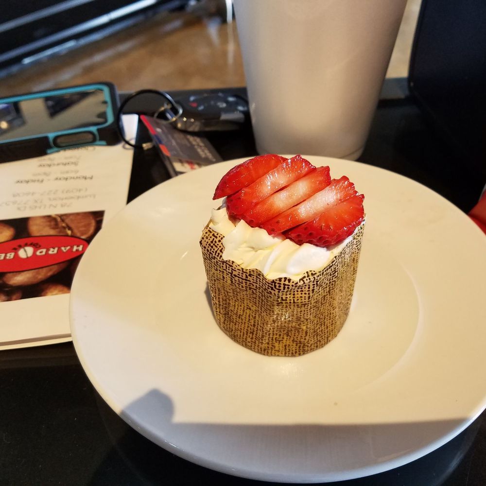 Hard Bean Coffee - Cheese cake cup with some of the lightest whipped cream topped with strawberries. - Coffee & Tea Near Me - Lumberton, Texas Hard Bean Coffee - Cheese cake cup with some of the lightest whipped cream topped with strawberries. - Coffee & Tea Near Me - Lumberton, Texas