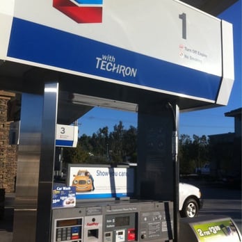 Chevron - a gas station with a car at the pump - Gas Stations Near Me - Murrieta, California