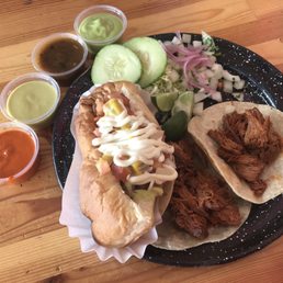 Hotdog, birria tacos (one flour, one corn), hot sauces. Hotdog, birria tacos (one flour, one corn), hot sauces.