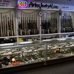 Large selection of hunting rifles, shotguns, and handguns