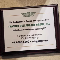 A photo of the Thacher Restaurant Group LLC Franchise phone # that I was instructed to call when I had a problem at Kent Station Wingstop. A photo of the Thacher Restaurant Group LLC Franchise phone # that I was instructed to call when I had a problem at Kent Station Wingstop.