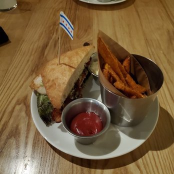 The Marq - Tuscan chicken sandwich with sweet potato fries - New American Near Me - Chicago, Illinois