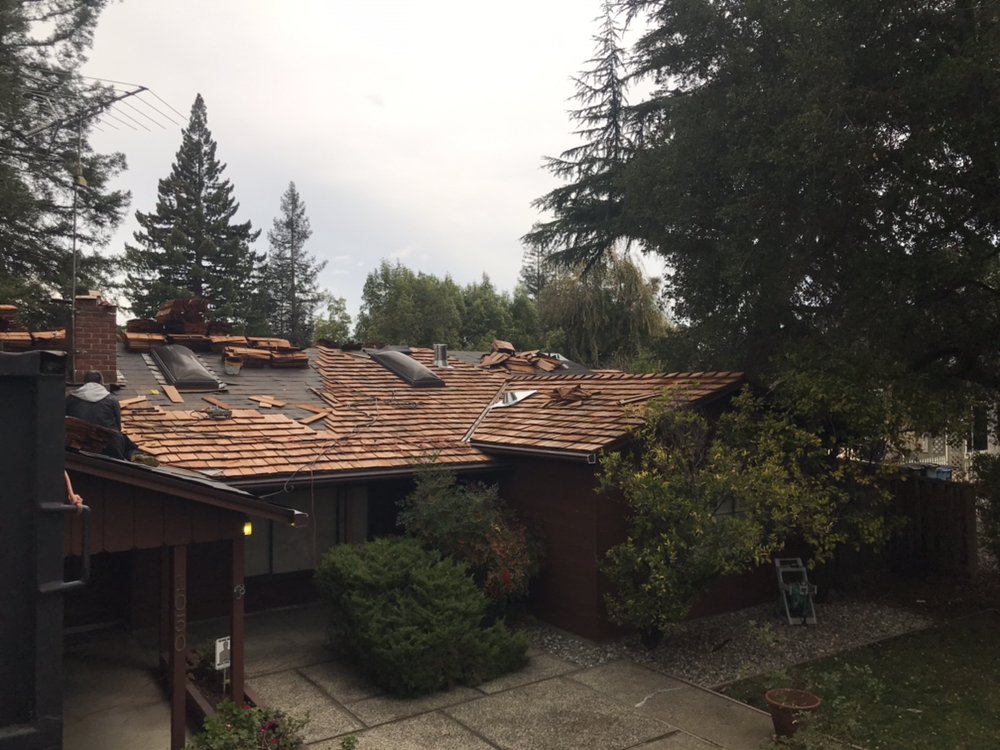 Slide of Alpha Roofing Company