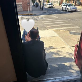 Levant Mediterranean Cuisine - Owner sitting and talking to my mother after he assisted her outside of the restaurant - Mediterranean Near Me - York, Pennsylvania