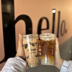 TJ Cups - TJ Signature Milk Tea 75% sugar with brown sugar agar boba. Double Peach Tea 50% sugar with lychee jelly.
