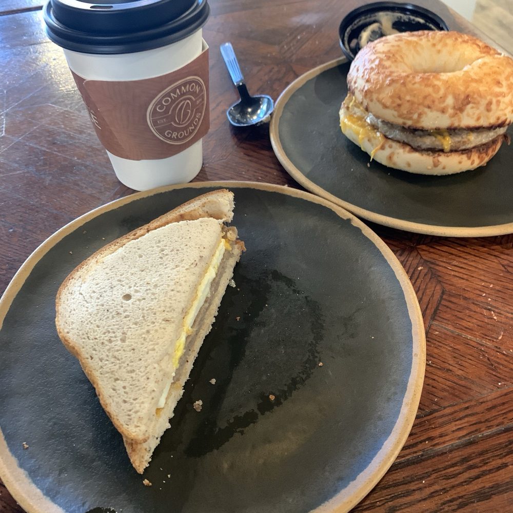 Common Grounds Brew & Roastery - On left GF sausage, egg, and cheddar cheese with almond milk mocha On right Asiago sausage, egg, and cheddar cheese - Coffee & Tea Near Me - Boynton Beach, Florida Common Grounds Brew & Roastery - On left GF sausage, egg, and cheddar cheese with almond milk mocha On right Asiago sausage, egg, and cheddar cheese - Coffee & Tea Near Me - Boynton Beach, Florida