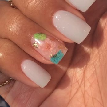 Mayra Nails & Spa - dip powder on natural nails with acrylic encapsulated dried flowers and gold flakes on ring finger $45 - Nail Salons Near Me - Jamaica, New York Mayra Nails & Spa - dip powder on natural nails with acrylic encapsulated dried flowers and gold flakes on ring finger $45 - Nail Salons Near Me - Jamaica, New York