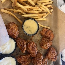 Asian zing boneless wings with fries