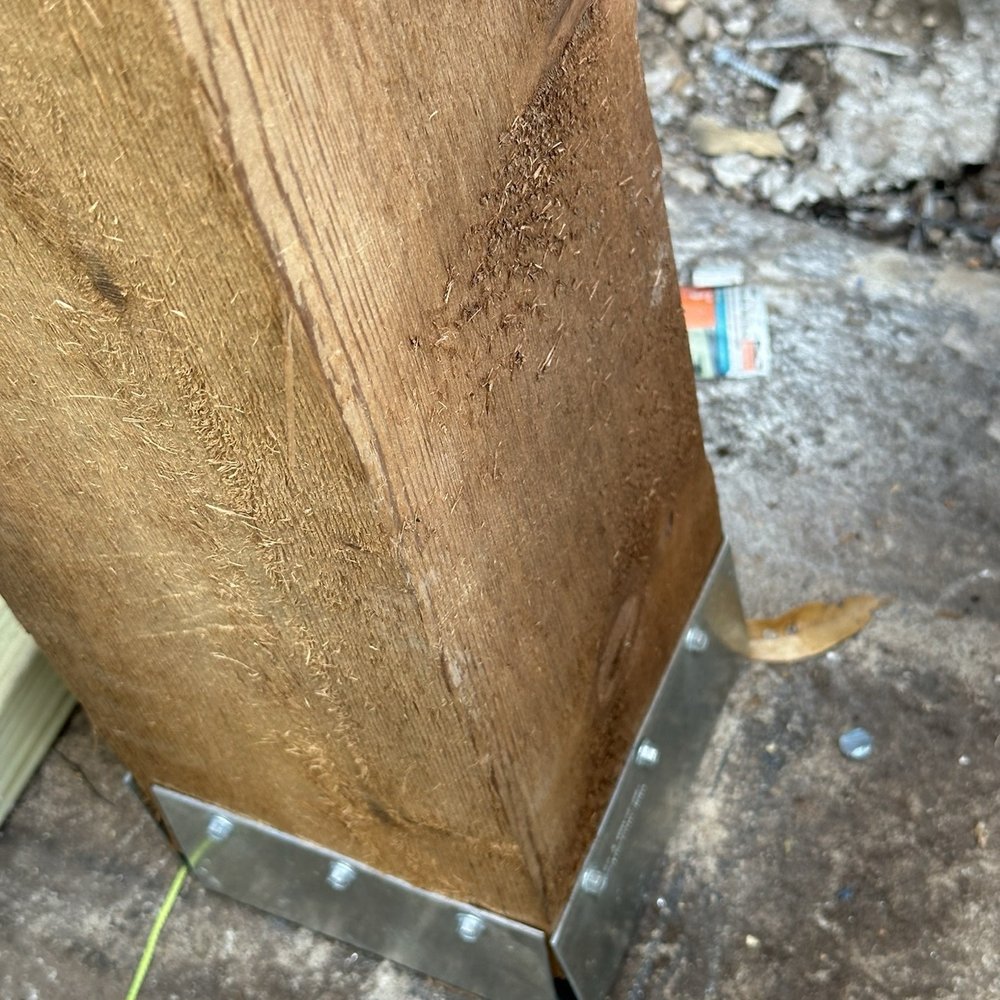 Samuel Decks & Fence - Bottom of new cedar post. - Fences & Gates Near Me Samuel Decks & Fence - Bottom of new cedar post. - Fences & Gates Near Me