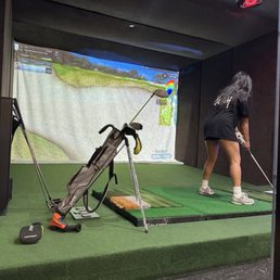 Golf Stimulator -- you can bring your own set of clubs or they have some that are provided. Golf Stimulator -- you can bring your own set of clubs or they have some that are provided.