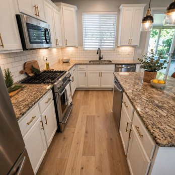 Stockton Paints - Kitchen cabinets repainted white by Stockton Paints (other details inserted and redesigned by AI app for illustration purposes only) - Painters Near Me Stockton Paints - Kitchen cabinets repainted white by Stockton Paints (other details inserted and redesigned by AI app for illustration purposes only) - Painters Near Me