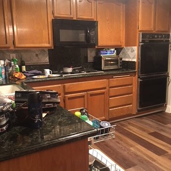 So Cal WoodWorks - Before - Contractor special countertop and oak veneer cabinets. - Cabinetry Near Me