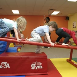 The Little Gym of Newtown Square - Serious Fun on the parallel bars!