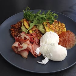 Green Seeds Temora - Our gluten free corn fritters with poached egg, avo smash, Stella's GF relish and local bacon.