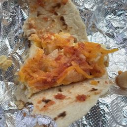 Potato, egg and cheese taco with salsa. Perfect on a cold morning. Potato, egg and cheese taco with salsa. Perfect on a cold morning.
