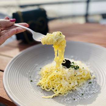 Como - Fresh Tajarin with butter and sage with grounded truffles. - Italian Near Me - Kirkland, Washington Como - Fresh Tajarin with butter and sage with grounded truffles. - Italian Near Me - Kirkland, Washington